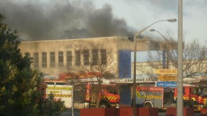 Fire fighters are battling a blaze at a Porirua shopping centre. - Missy Winiata/Facebook